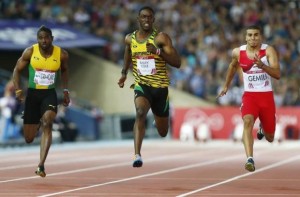 Bailey-Cole finishes first place ahead of Gemili and Livermore during the men's 100m final at the 2014 Commonwealth Games in Glasgow