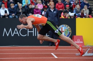 US athlete Jeremy Wariner rises from the